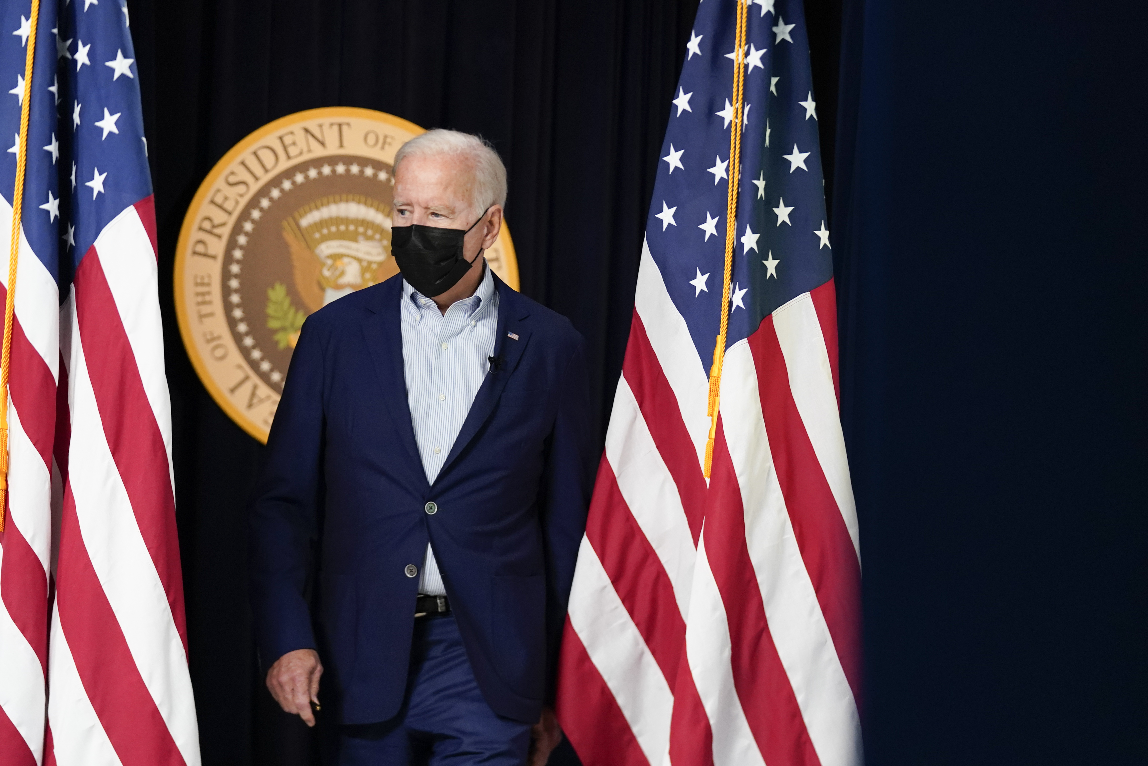 President Joe Biden arrives to attend a FEMA briefing on Hurricane Ida in the South Court Auditorium in the Eisenhower Executive Office Building on the White House Campus, Saturday, in Washington.