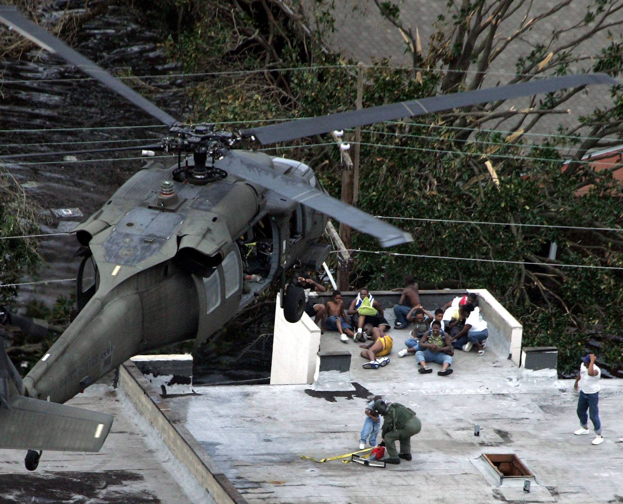 Residents are rescued by helicopter from the floodwaters of Hurricane Katrina in New Orleans on Sept. 1, 2005. 