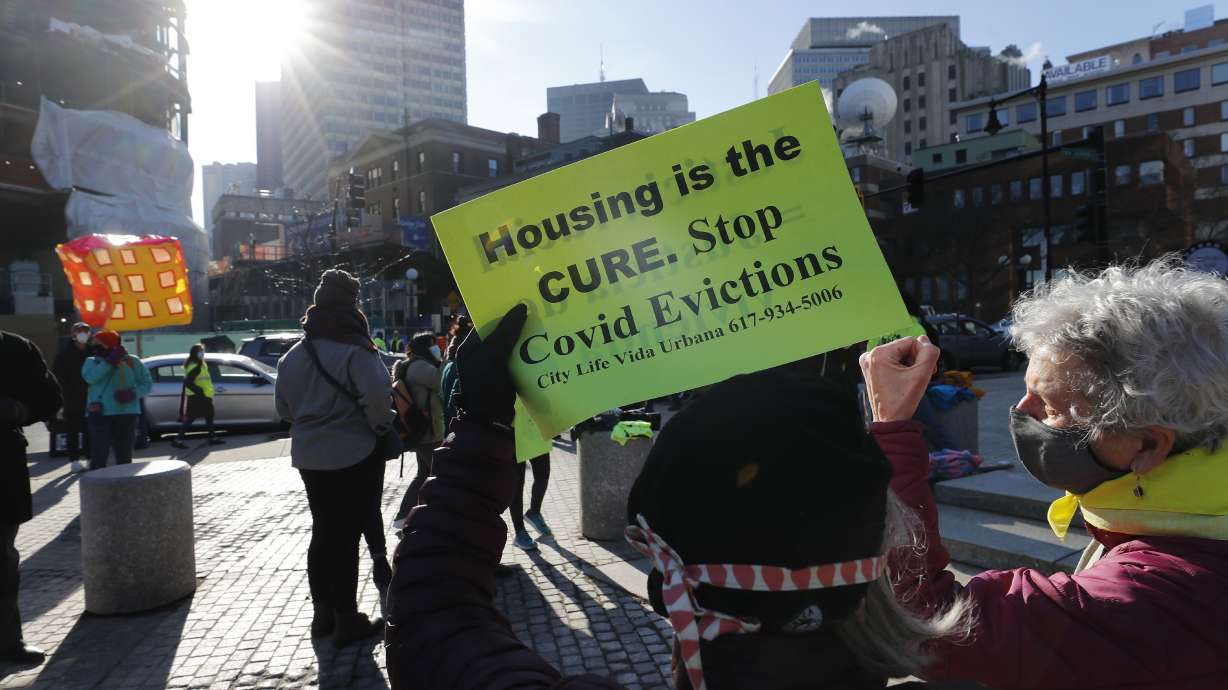 Tenants' rights advocates demonstrate outside the Edward W. Brooke Courthouse in Boston, Jan. 13, 2021. States have begun to ramp up the amount of rental assistance reaching tenants, but there are still millions of families facing eviction who haven't gotten help.