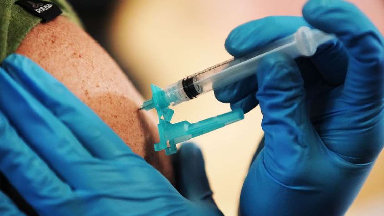 A COVID-19 vaccination is given at Utah Valley University in Orem on Aug. 26. Utah health officials reported 1,685 additional COVID-19 cases on Wednesday, as well as six deaths.