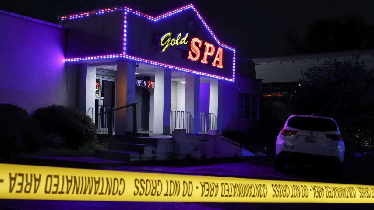 Crime scene tape surrounds Gold Spa after deadly shootings at a massage parlor and two day spas in the Atlanta area, on March 16.