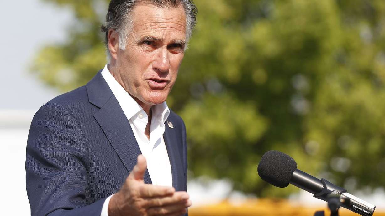 Utah Sen. Mitt Romney speaks to reporters during a media event in Salt Lake City on Thursday. On Sunday, Romney placed equal blame on both the Biden and Trump administrations for the current situation in Afghanistan, warning
that the "decision to pull our military out of Afghanistan puts us in greater danger.”