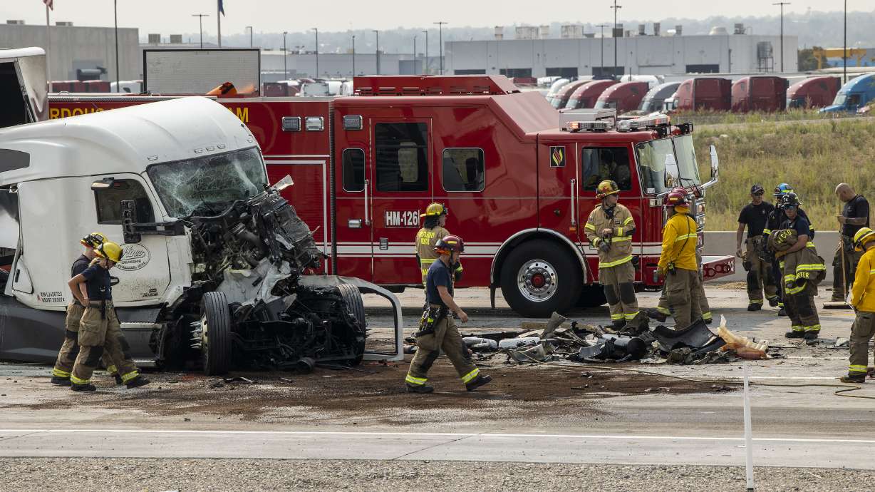 Emergency crews respond to a fatal semitruck accident on state Route 201 at 5600 West in West Valley City on Monday.