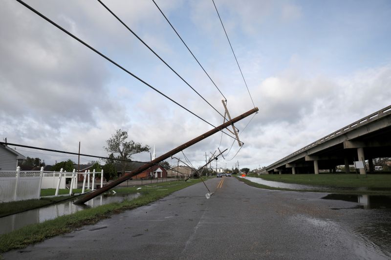 A damaged electric line is pictured after Hurricane Ida made landfall in Louisiana, in Kenner, Louisiana, on August 30, 2021. Two people were killed and 10 injured when a deep crevasse opened up on a Mississippi highway in the wake of heavy rains unleashed by Hurricane Ida.