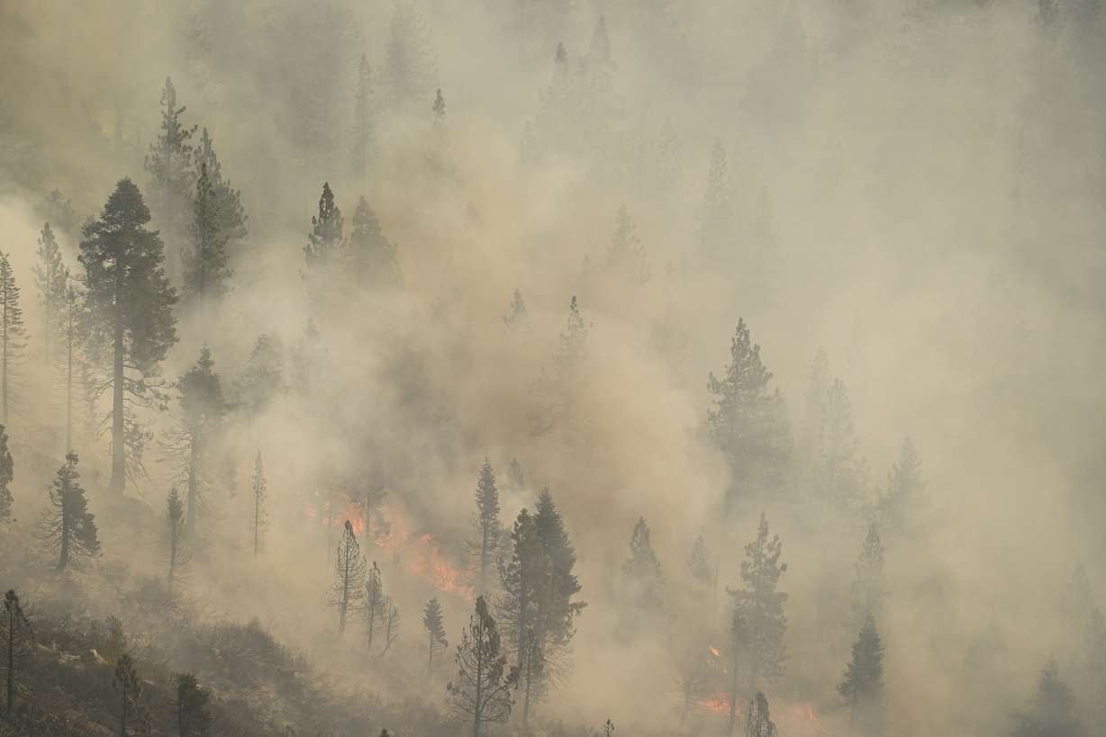 The Caldor Fire consumes trees in South Lake Tahoe, Calif., Tuesday.