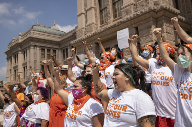Women protest against the six-week abortion ban at the Capitol in Austin, Texas, on Wednesday. Dozens of people protested the abortion restriction law that went into effect Wednesday.
