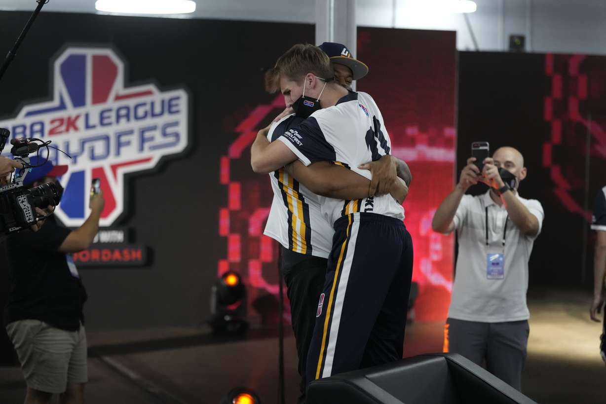 Jazz Gaming celebrates winning the 2021 Western Conference Championship in Dallas, Texas at the Mavs Gaming Hub.