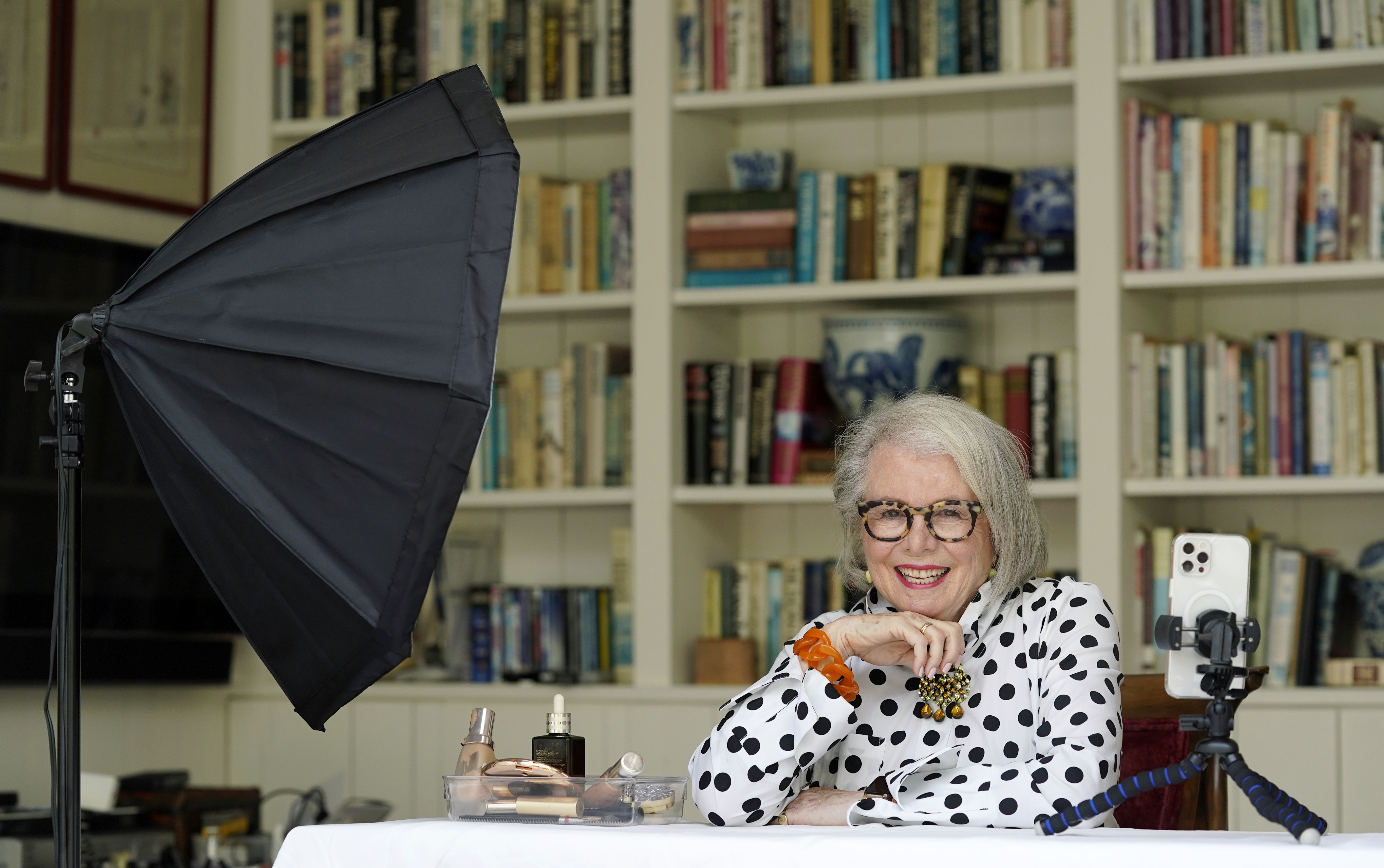 Senior influencer Sandra Sallin, 80, poses for a portrait at home, Friday, Aug. 20, 2021, in Los Angeles. Sallin is among a growing number of seniors making names for themselves on social media.