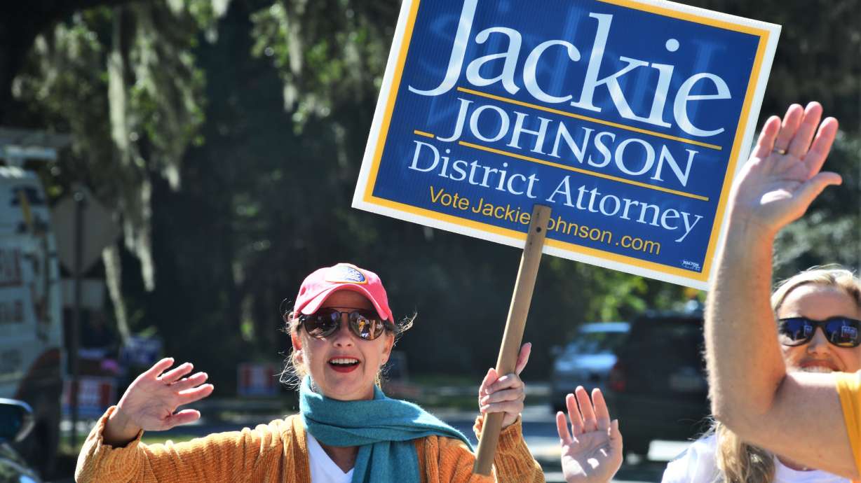 District Attorney Jackie Johnson campaigns for reelection on St. Simons Island, Ga. Nov. 3, 2020. Johnson, a former Georgia prosecutor was indicted Thursday on misconduct charges.