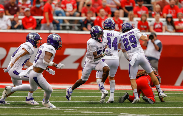 Weber State Wildcats wide receiver Rashid Shaheed (22) scores on a kickoff return during the season opener at Rice-Eccles Stadium in Salt Lake City on Thursday, Sept. 2, 2021.