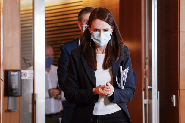 New Zealand Prime Minister Jacinda Ardern arrives at a press conference following the Auckland supermarket terror attack at parliament in Wellington, New Zealand, Friday.