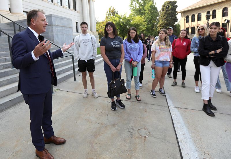 University of Utah President Taylor Randall talks to a
group of prospective and incoming students touring the University
of Utah campus in Salt Lake City on Aug. 20.
