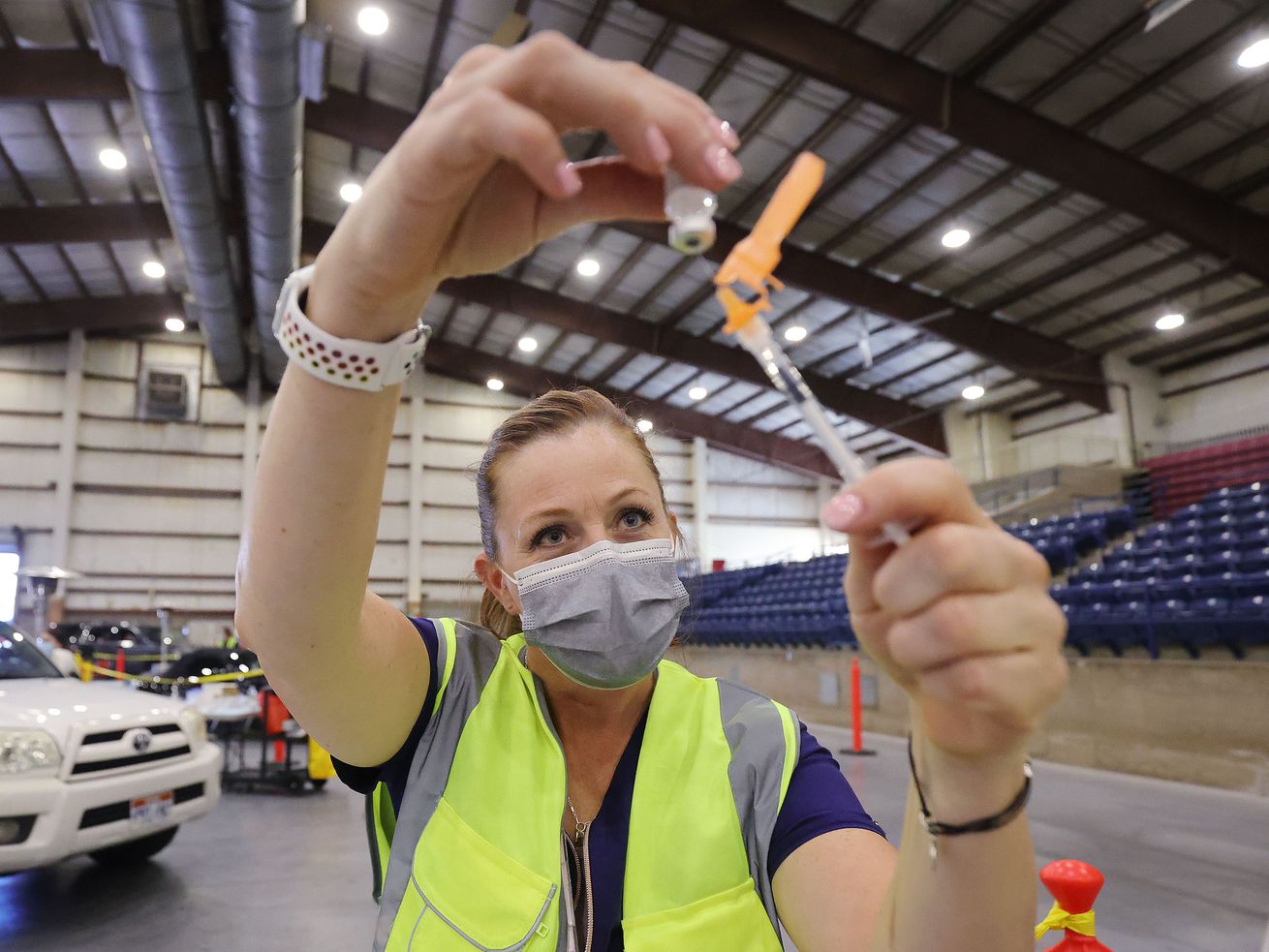 Annie Sullivan draws a COVID-19 vaccine at the Legacy
Events Center in Farmington on May 13 where the
Davis County Health Department offered Pfizer-BioNTech vaccines to
anyone 12 years of age and older.