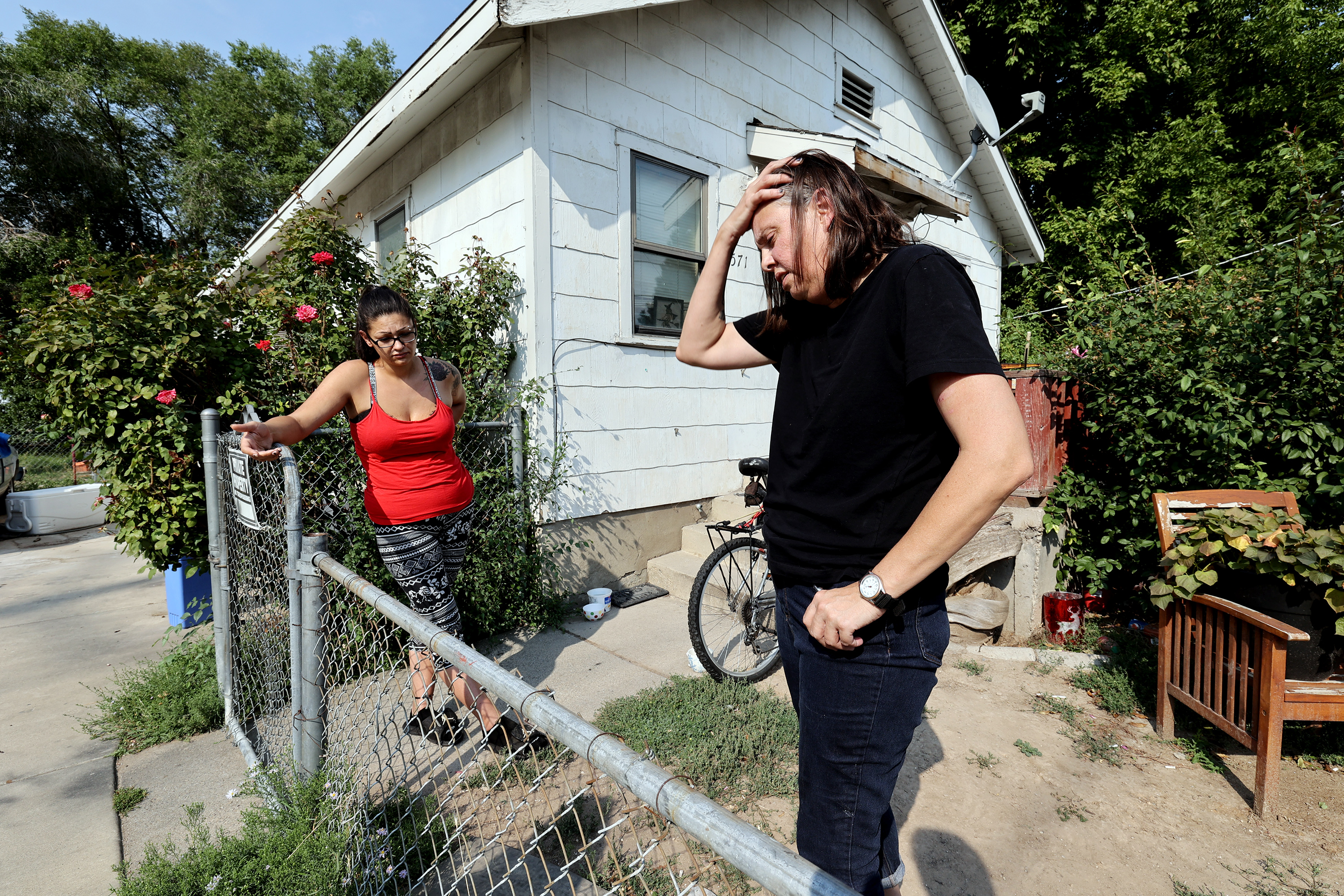 Lyndsey Vence, left, and Tami Jordan, who are renters on the border of South Salt Lake and Millcreek along 3900 South, talk on Wednesday about being forced to find a new home in Utah's tight rental market after a high-end developer bought seven homes on their block.