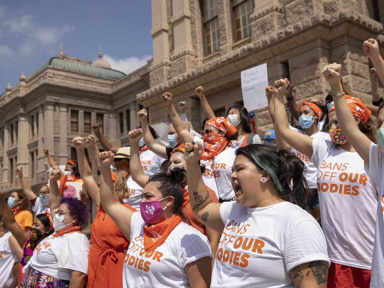 Women protest against the six-week abortion ban at the
Capitol in Austin, Texas, on Wednesday. Dozens of
people protested the abortion restriction law that went into effect
Wednesday.