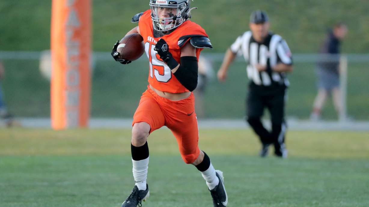 Skyridge's Jace Doman runs for a touchdown after intercepting a pass intended for Orem during a high school football game at Skyridge High School in Lehi on Friday, Sept. 3, 2021.