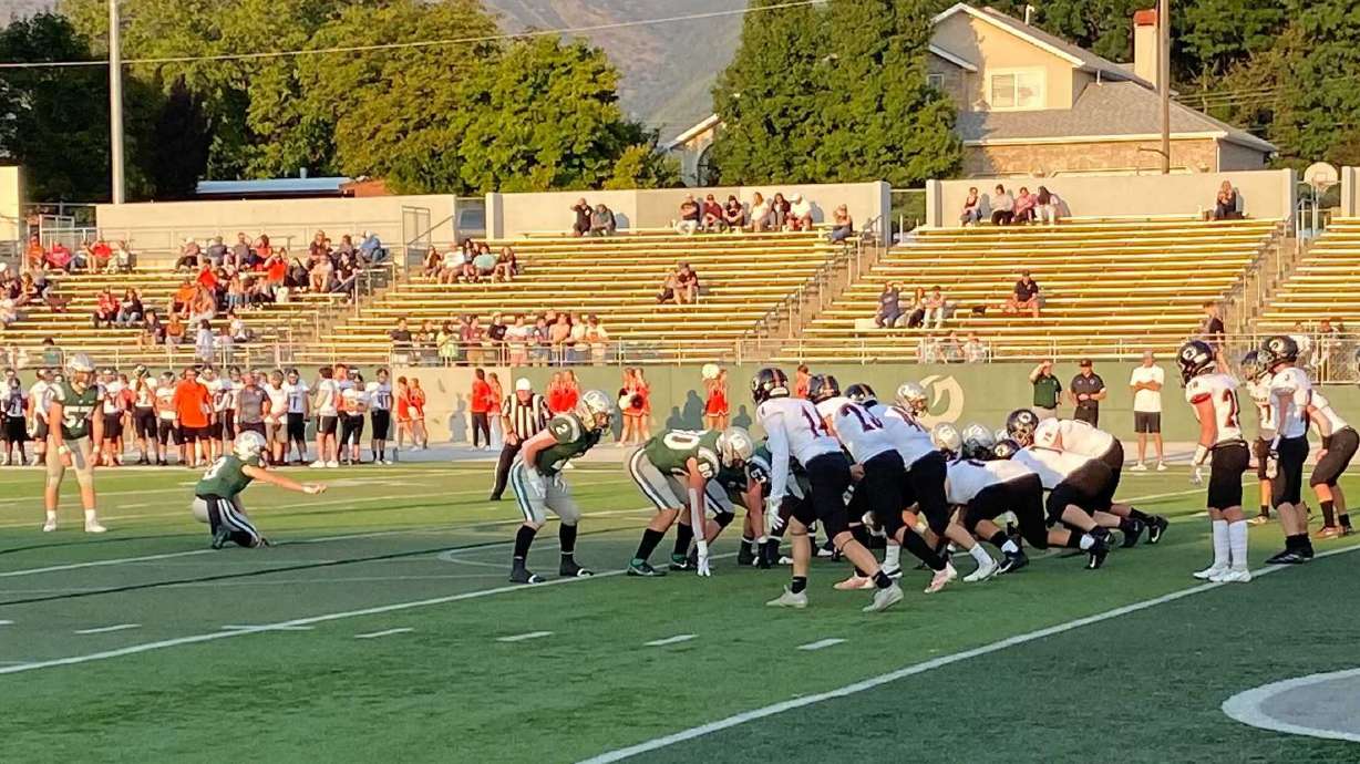 Olympus prepares to kick a field in a game against Murray on Sept. 3, 2021.