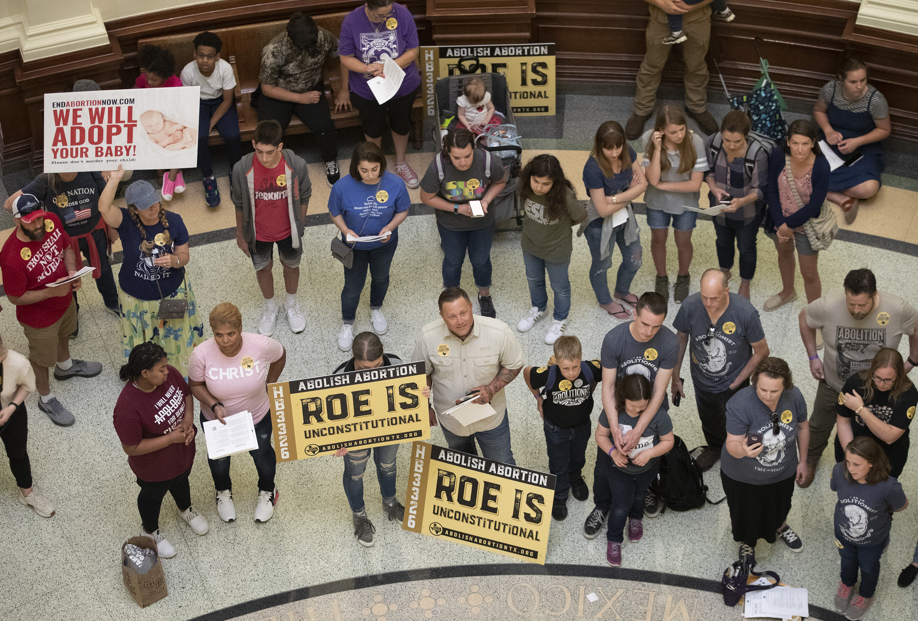Pro-life demonstrators gather in the rotunda at the Capitol while the Senate debated anti-abortion bills in Austin, Texas on May 30.
