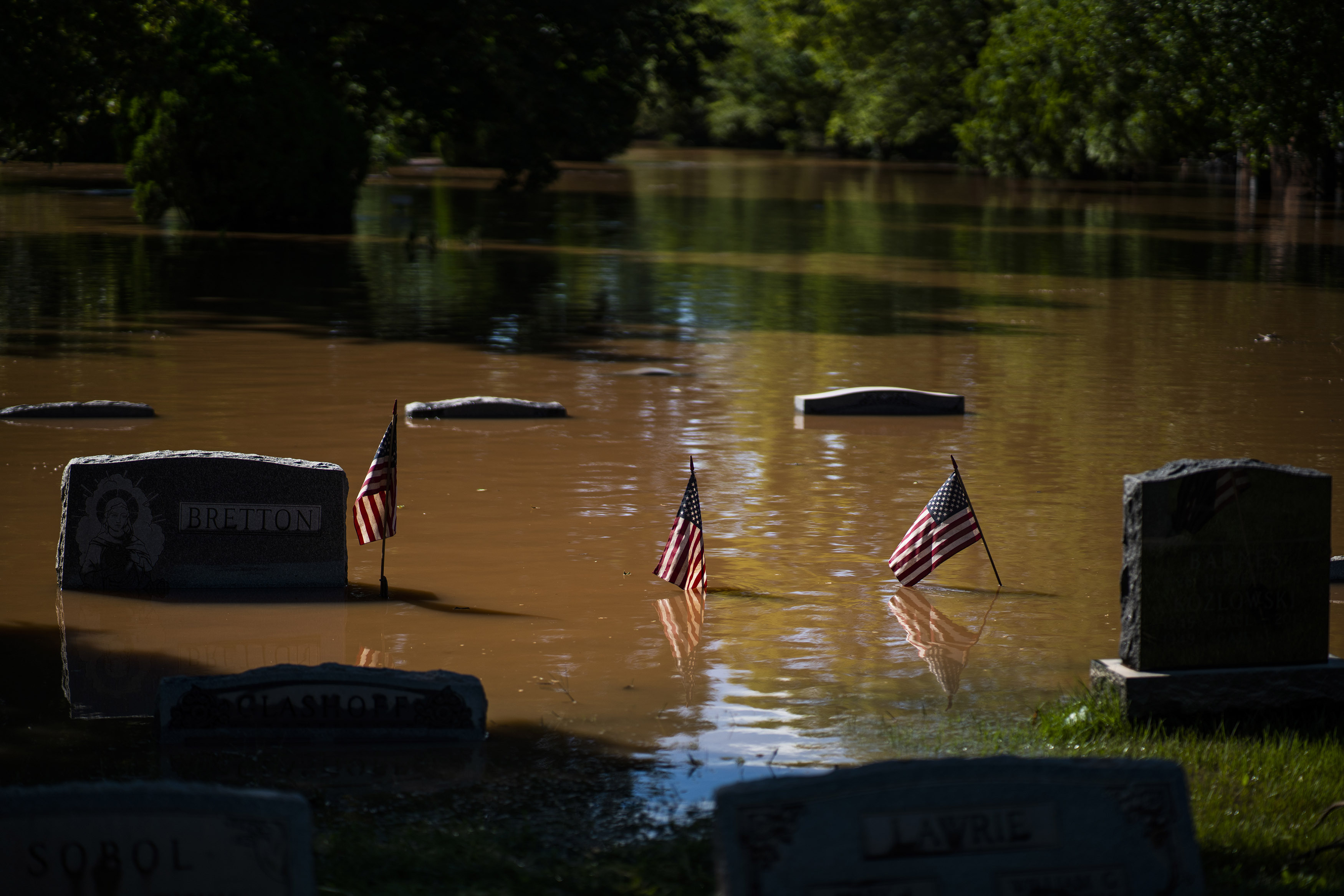 Headstones at a cemetery that flooded are seen in Somerville, N.J., on Sept. 2.
