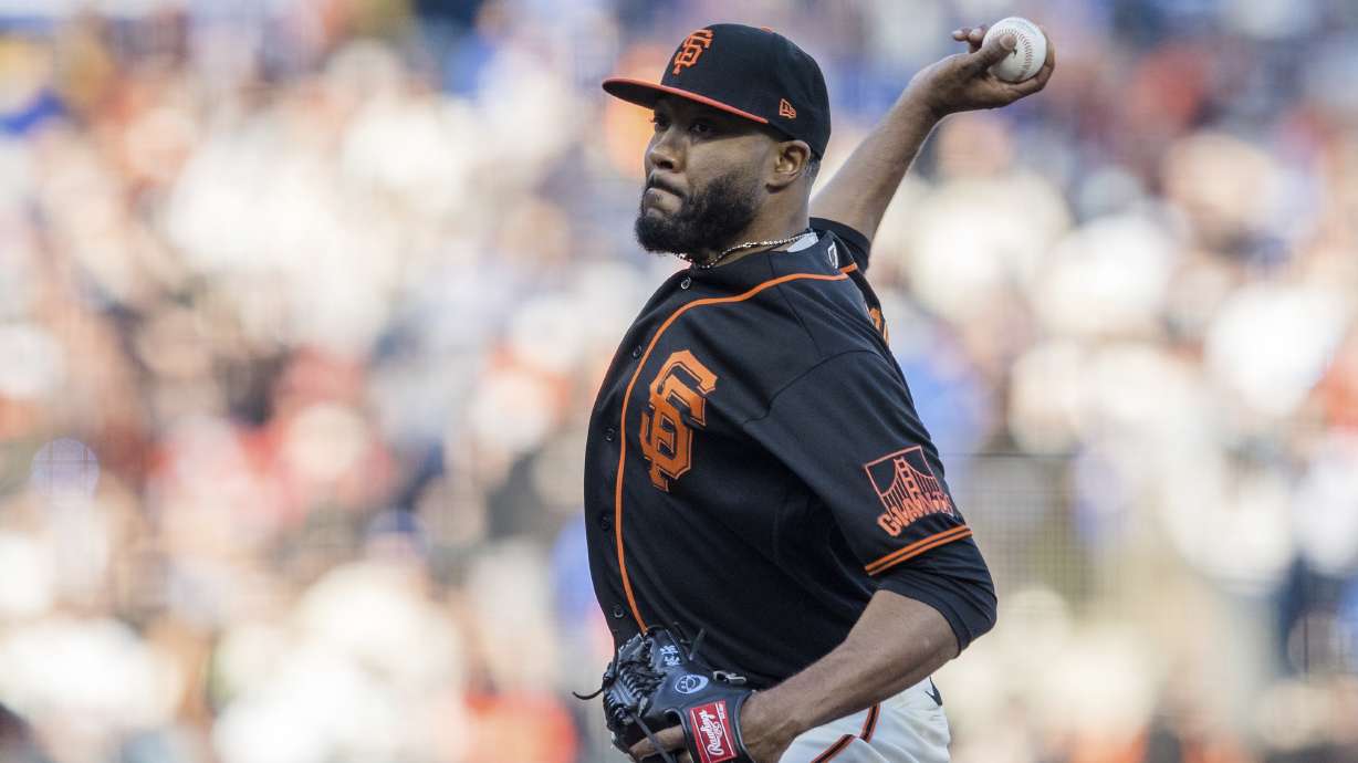 Then-San Francisco Giants pitcher Jay Jackson hurls a pitch against the Los Angeles Dodgers in San Francisco on Sept. 4, 2021. Jackson, now with the Toronto Blue Jays, is finding a way to balance baseball and family after his son was born 14 to 15 weeks early in Utah.