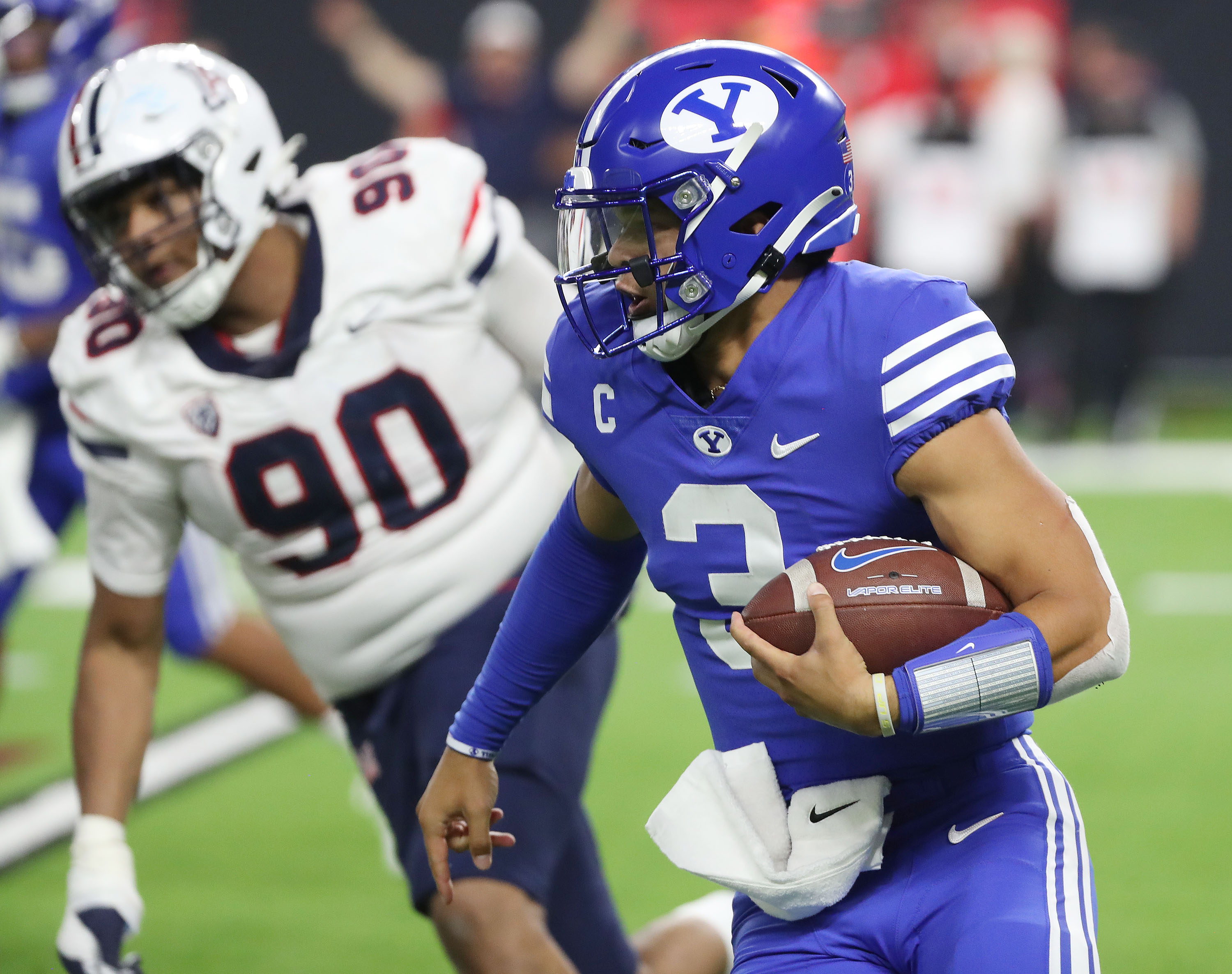 BYU quarterback Jaren Hall (3) runs during the Vegas Kickoff Classic in Las Vegas on Saturday, Sept. 4, 2021. BYU won 24-16.