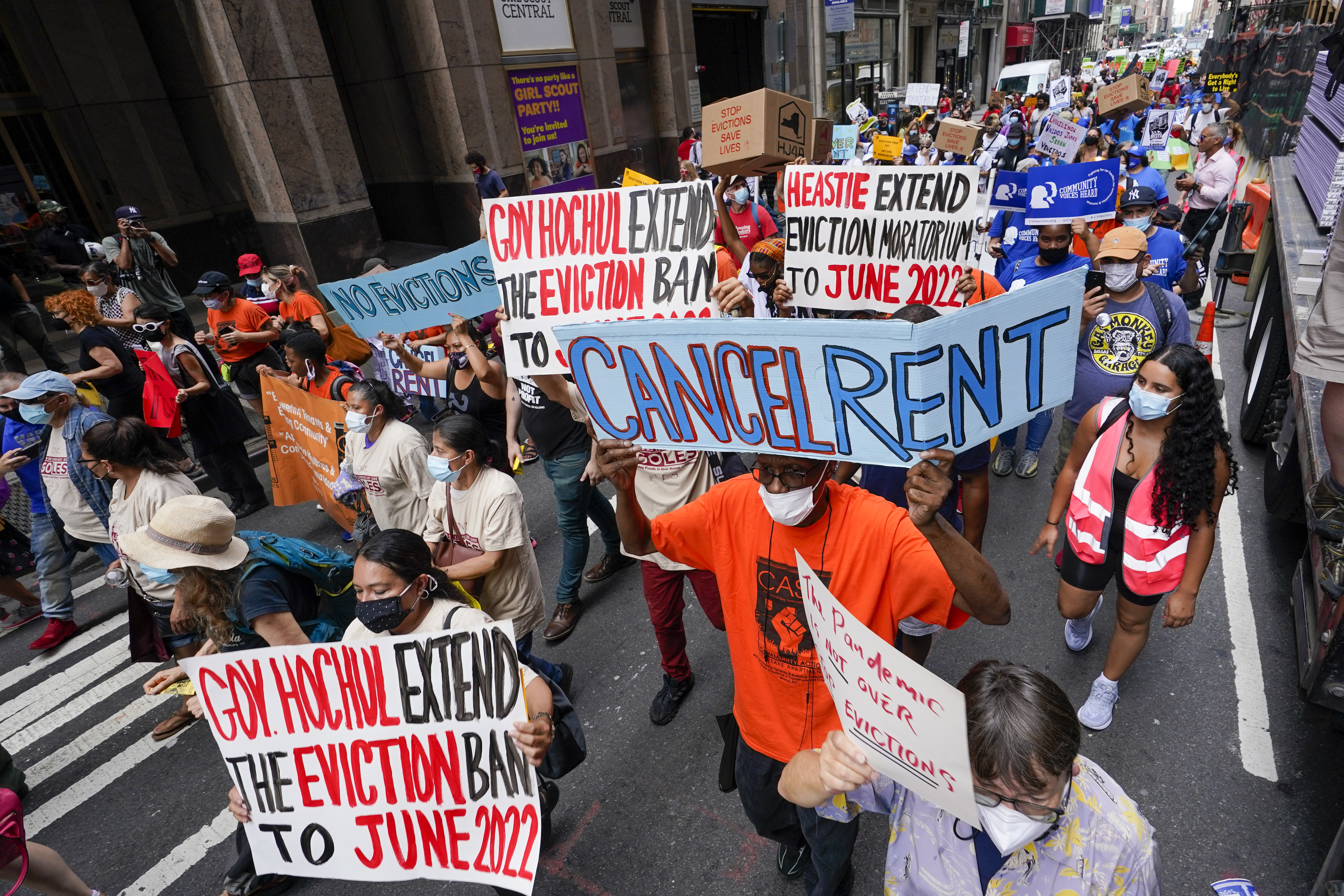 Activists march across town toward New York Gov. Kathy Hochul's office on Aug. 31 in New York, during a demonstration to call on Hochul, Speaker Carl Heastie, and Senate Majority Leader Andrea Stewart-Cousin to extend pandemic-era eviction protections in wake of a Supreme Court decision lifting the moratorium.