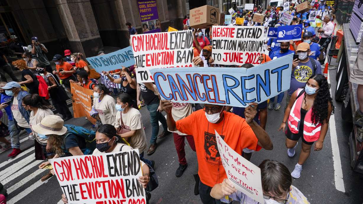 Activists march across town toward New York Gov. Kathy Hochul's office on Aug. 31 in New York, during a demonstration to call on Hochul, Speaker Carl Heastie, and Senate Majority Leader Andrea Stewart-Cousin to extend pandemic-era eviction protections in wake of a Supreme Court decision lifting the moratorium.
