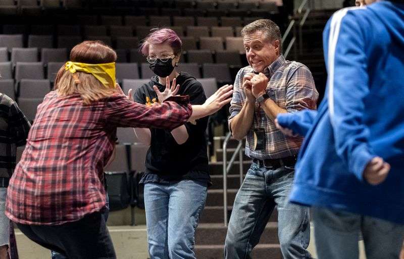 Weber High School theater teacher Mark Daniels, third
from left, does an improvised skit with students in his beginning
theater class at the school in Pleasant View, Weber County, on
Friday. Daniels has been named 2022 Utah Teacher of
the Year.