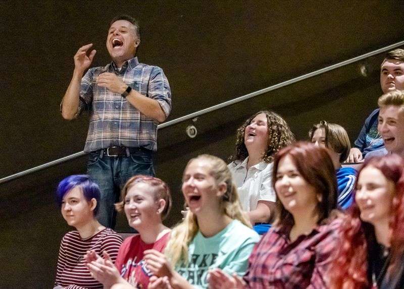 Weber High School theater teacher Mark Daniels laughs
during his beginning theater class at the school in Pleasant View,
Weber County, on Friday. Daniels has been named 2022
Utah Teacher of the Year.