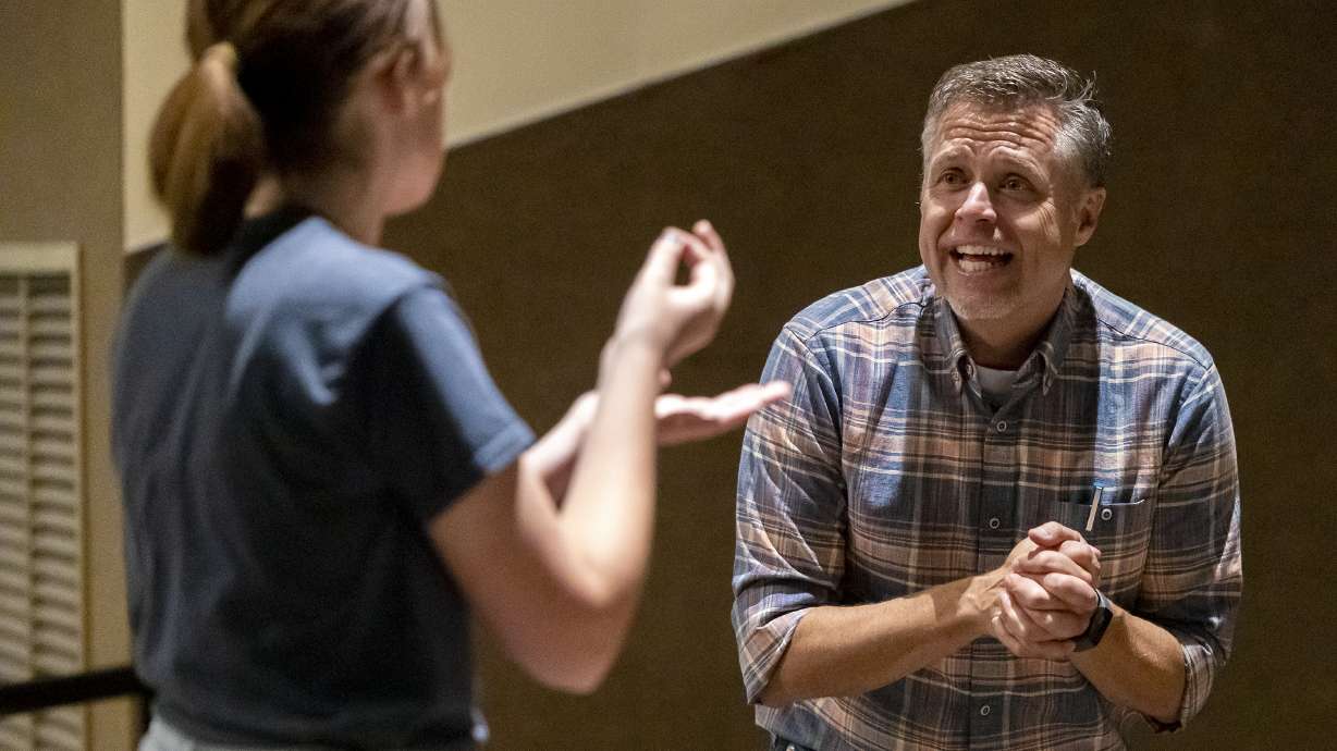 Weber High School theater teacher Mark Daniels, right, does an improvised skit with a student in his beginning theater class at the school in Pleasant View, Weber County, on Friday. Daniels has been named 2022 Utah Teacher of the Year.