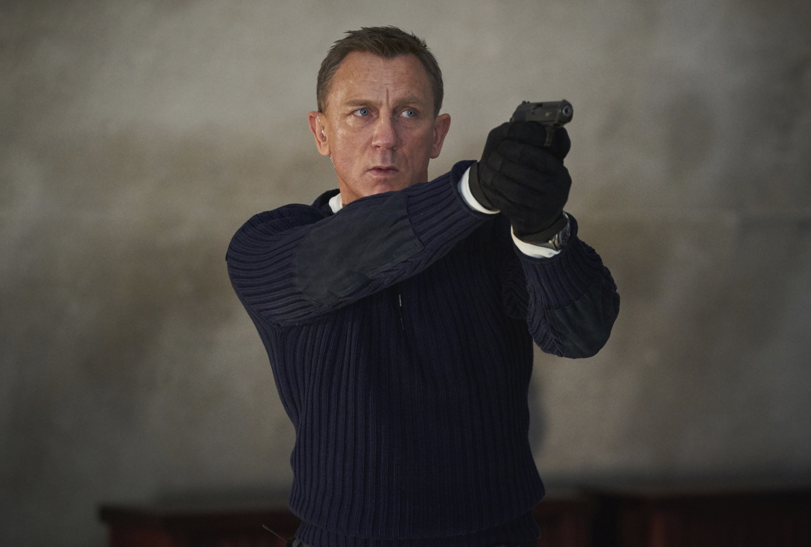 This image released by MGM shows Daniel Craig in a scene from "No Time To Die," in theaters on Oct. 8.
