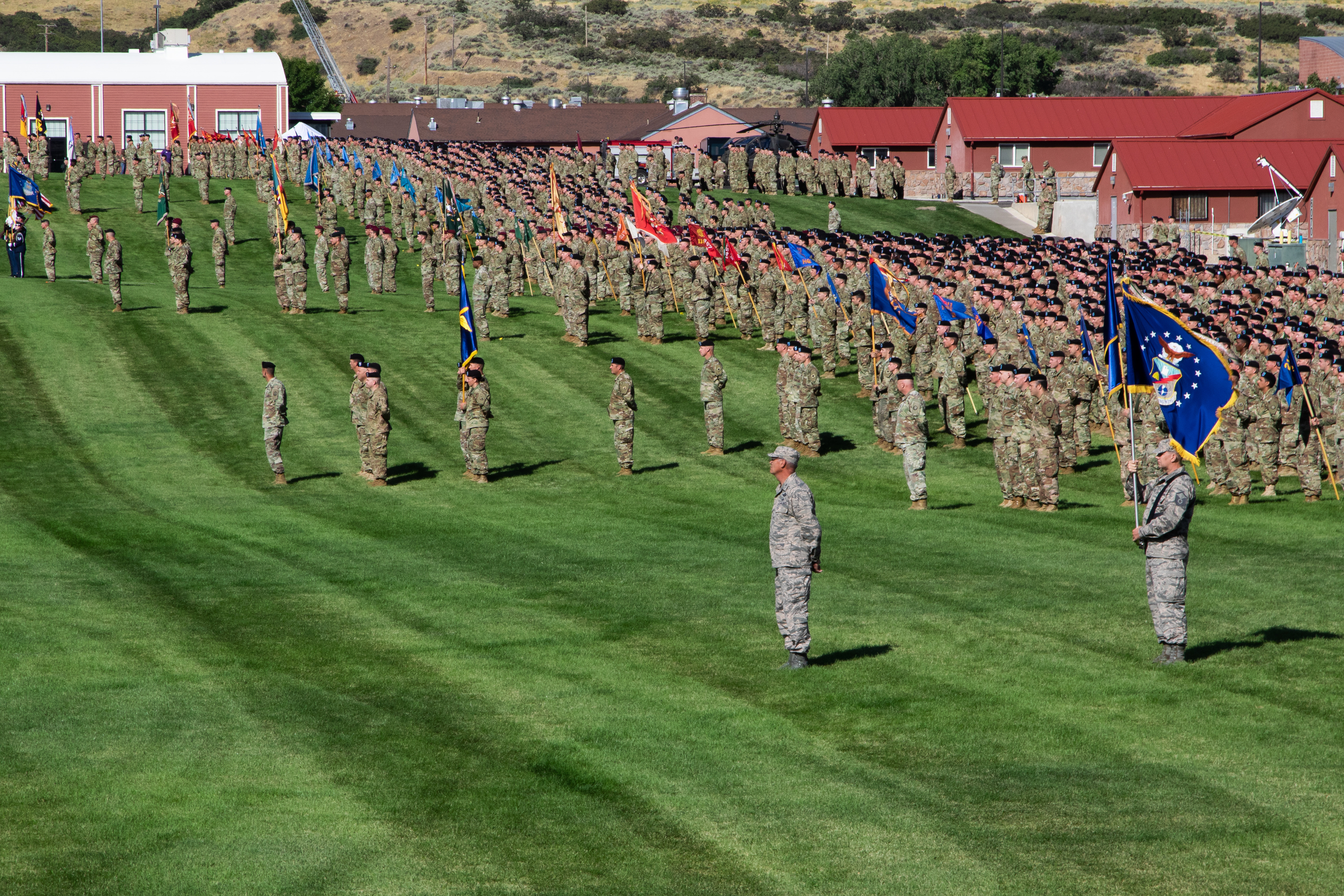 Over 7,000 Army and Air National Guardsmen stand in formation on Tarbet Field to participate in Utah's 65th annual Governor's Day ceremony on Sept. 14, 2019. 