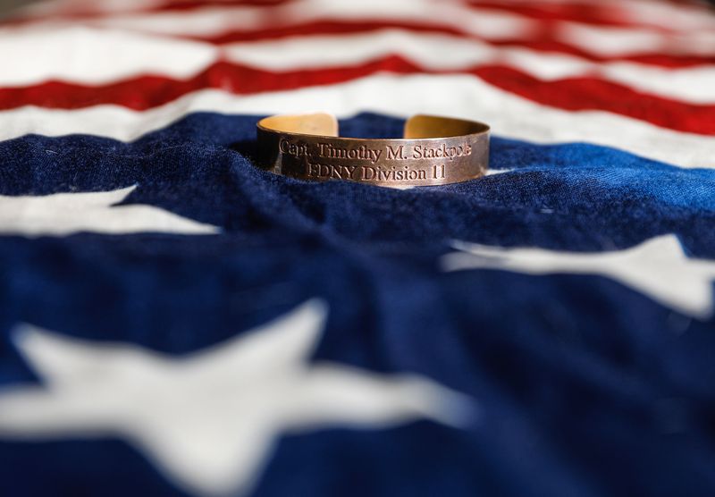 A bracelet belonging to Olympic speedskater Catherine
Raney Norman is pictured on Saturday, Aug. 28, 2021, at Utah
Olympic Oval in Kearns. Raney Norman wore the bracelet, which bears
the name of New York City firefighter killed in the 9/11 attacks,
while competing in the 2002 Winter Games in Salt Lake
City.