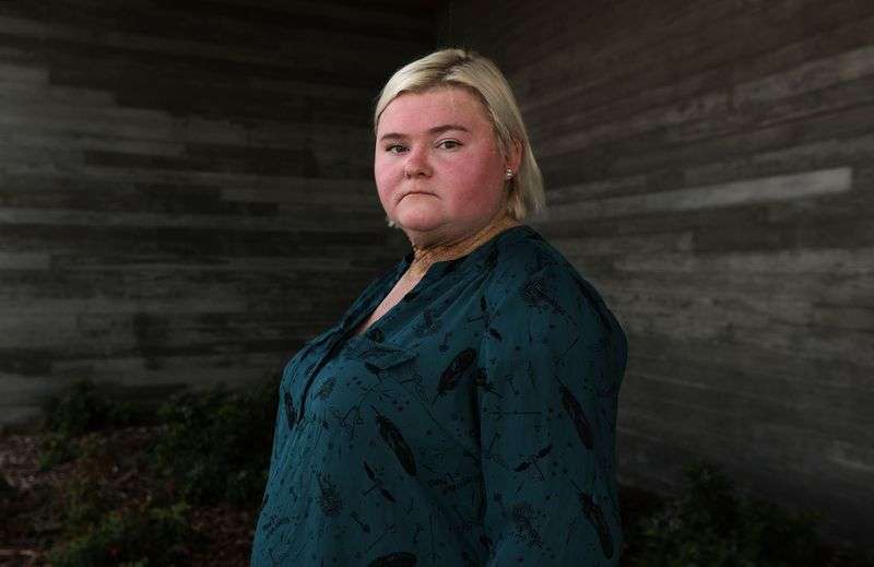 Kirstin Bone poses for a portrait outside of Utah
Valley University, where she is an English professor, in Orem on
Tuesday, Aug. 31, 2021. Bone was 12 at the time of the 9/11
terrorist attacks.