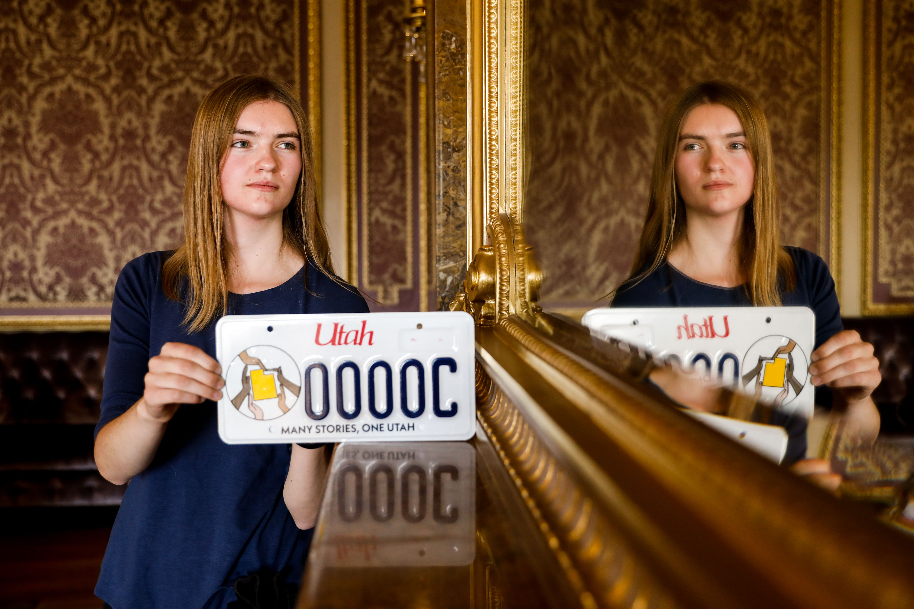 Eleanor Smith, student of BYU and designer of the new Utah license plate celebrating Martin Luther King Jr. and diversity, poses for a portrait, Thursday, Sept. 9, 2021 at the Capitol in Salt Lake City.