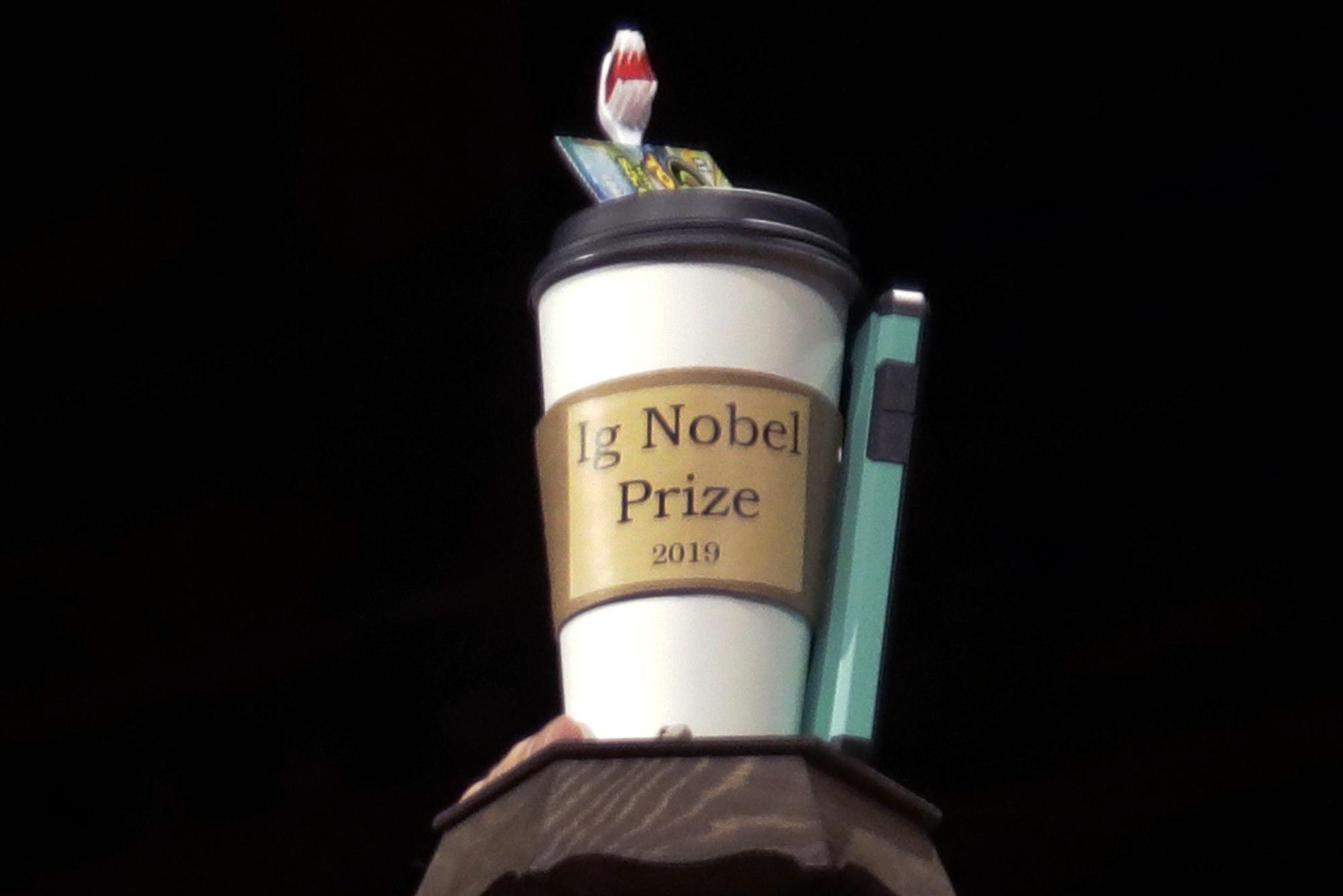 In this Sept. 12, 2019 file photo, the 2019 Ig Nobel award is displayed at the 29th annual Ig Nobel awards ceremony at Harvard University in Cambridge, Mass. 