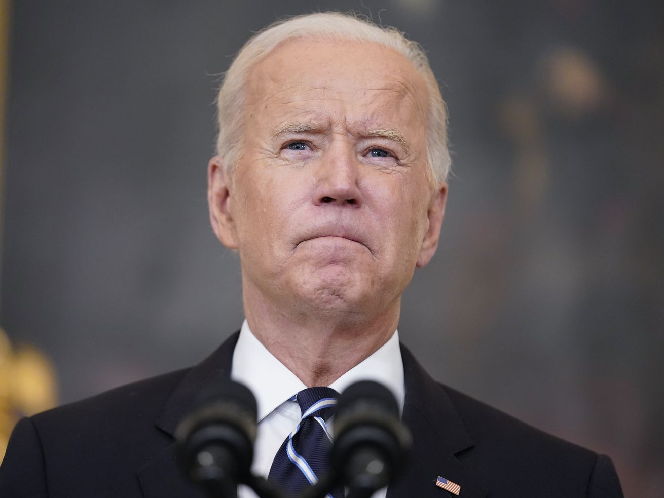 President Joe Biden pauses as he speaks in the State
Dining Room at the White House on Thursday in
Washington. Biden announced sweeping new federal vaccine
requirements affecting as many as 100 million Americans in an
all-out effort to increase COVID-19 vaccinations and curb the
surging delta variant.