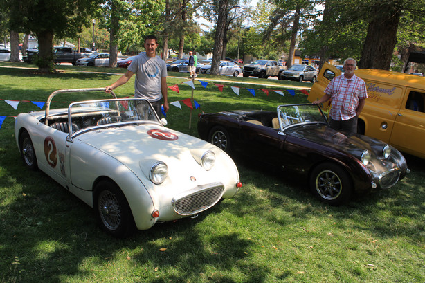 Skyler Sisson and his father, Jay, show their Austin-Healey Sprites at British Field Day in Salt Lake City on Aug. 28