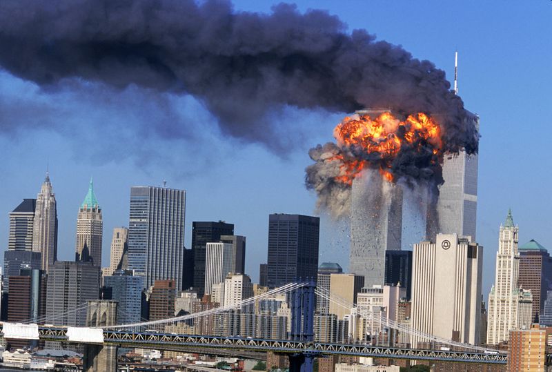An explosion rips through the south tower of the World
Trade Center after the hijacked United Airlines Flight 175, which
departed from Boston en route for Los Angeles, crashed into it on
Sept, 11, 2001. The north tower is shown burning after American
Airlines Flight 11 crashed into the tower at 8:45 a.m.