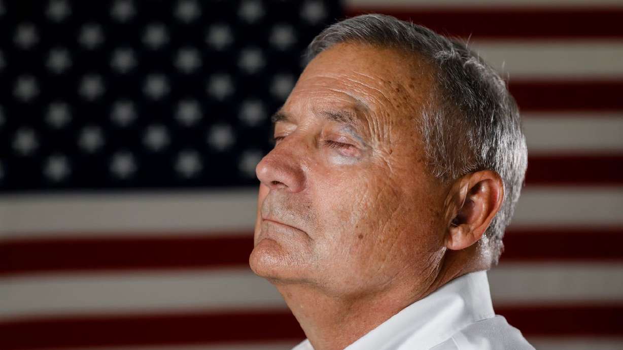 Retired Utah National Guard Lt. Col. Craig Morgan, who was at the Pentagon on 9/11, closes his eyes for a portrait at his
house in South Jordan on Monday. Morgan grew up in Provo and served in the military for 34 years.