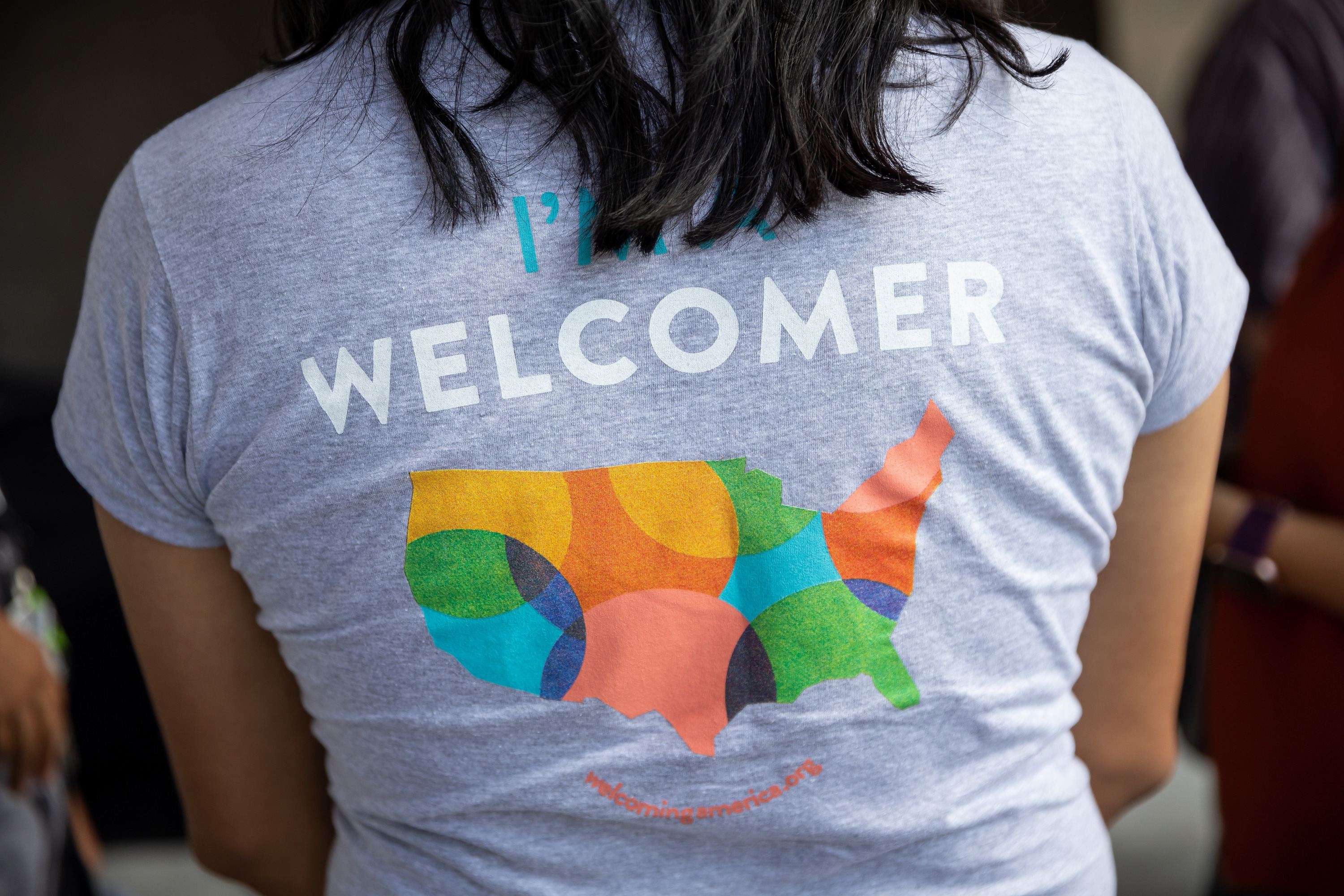 Efrén Corado García, diversity and inclusion officer for the Salt Lake County Mayor’s Office, talks with others who are helping to welcome refugees to the community at an event in Taylorsville on Friday. The event kicked off the upcoming Welcoming Week Salt Lake, which highlights the county’s success at bringing immigrants and refugees in to the community.