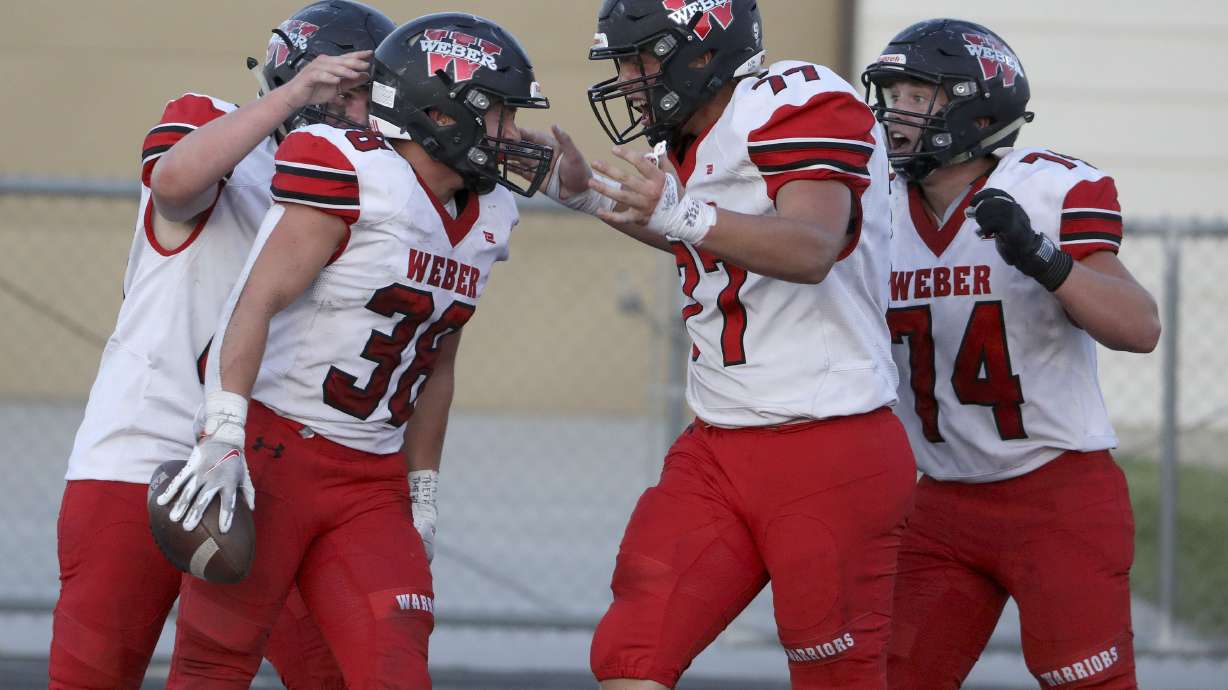 Weber and Bingham compete in a high school football game in South Jordan on Friday, Aug. 13, 2021.