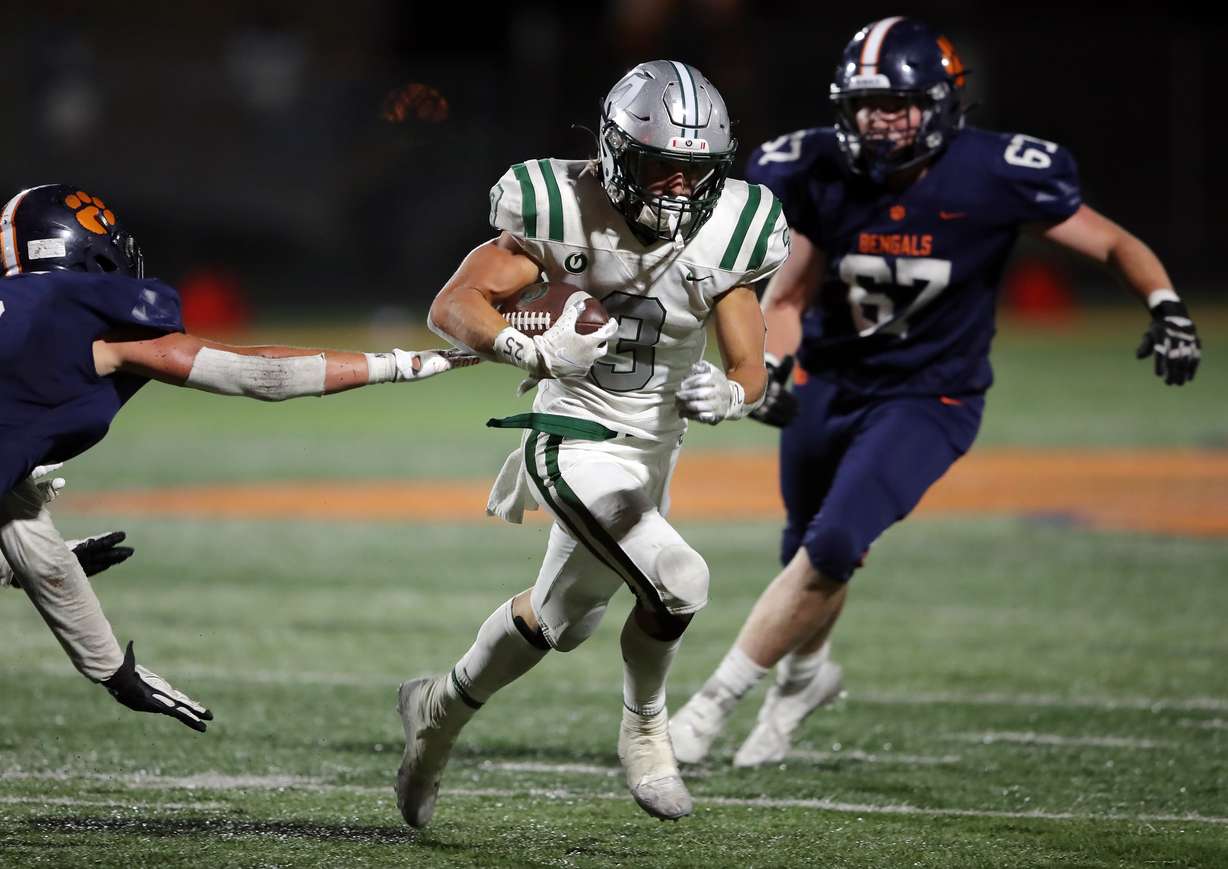 Olympus’ Ryan Reynard (3) breaks away for a run as the Titans and Brighton play a high school football game at Brighton in Cottonwood Heights on Friday, Sept. 10, 2021. Olympus won 35-28.