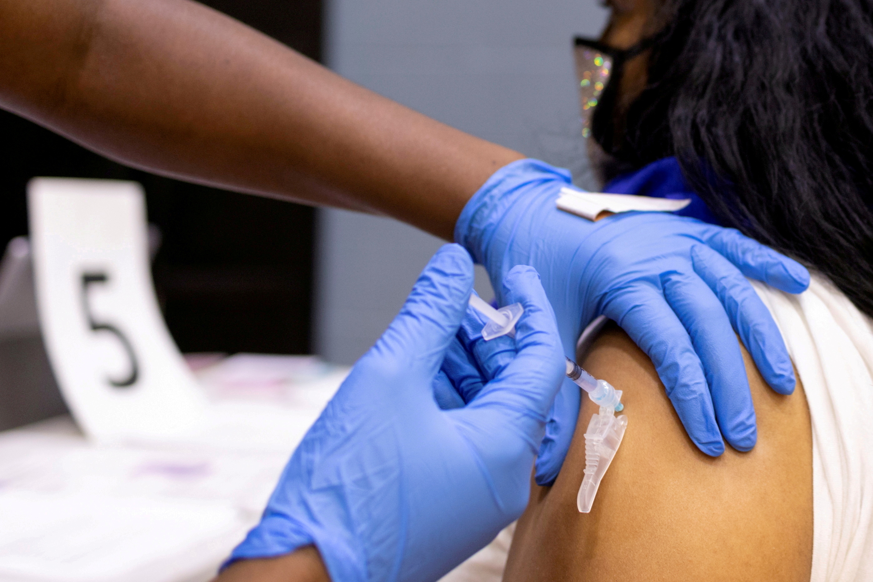A woman receives a COVID-19 vaccine at a clinic in Philadelphia, Pennsylvania, on May 18, 2021.