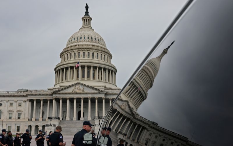 Capitol Police attend a morning briefing outside the U.S. Capitol in Washington on Aug. 3.
