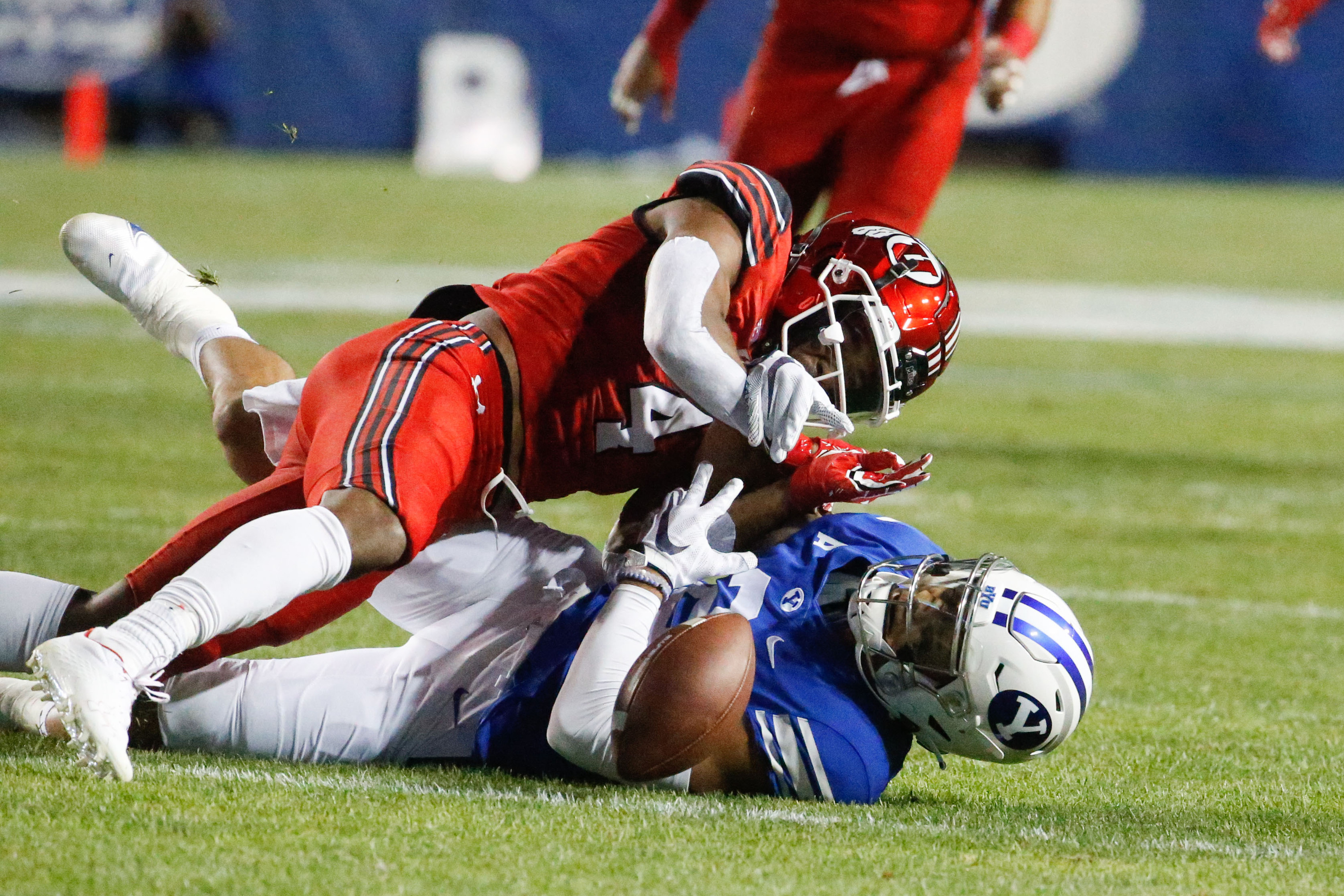 BYU and Utah compete during the first half of an NCAA college football game at LaVell Edwards Stadium in Provo on Saturday, Sept. 11, 2021.
