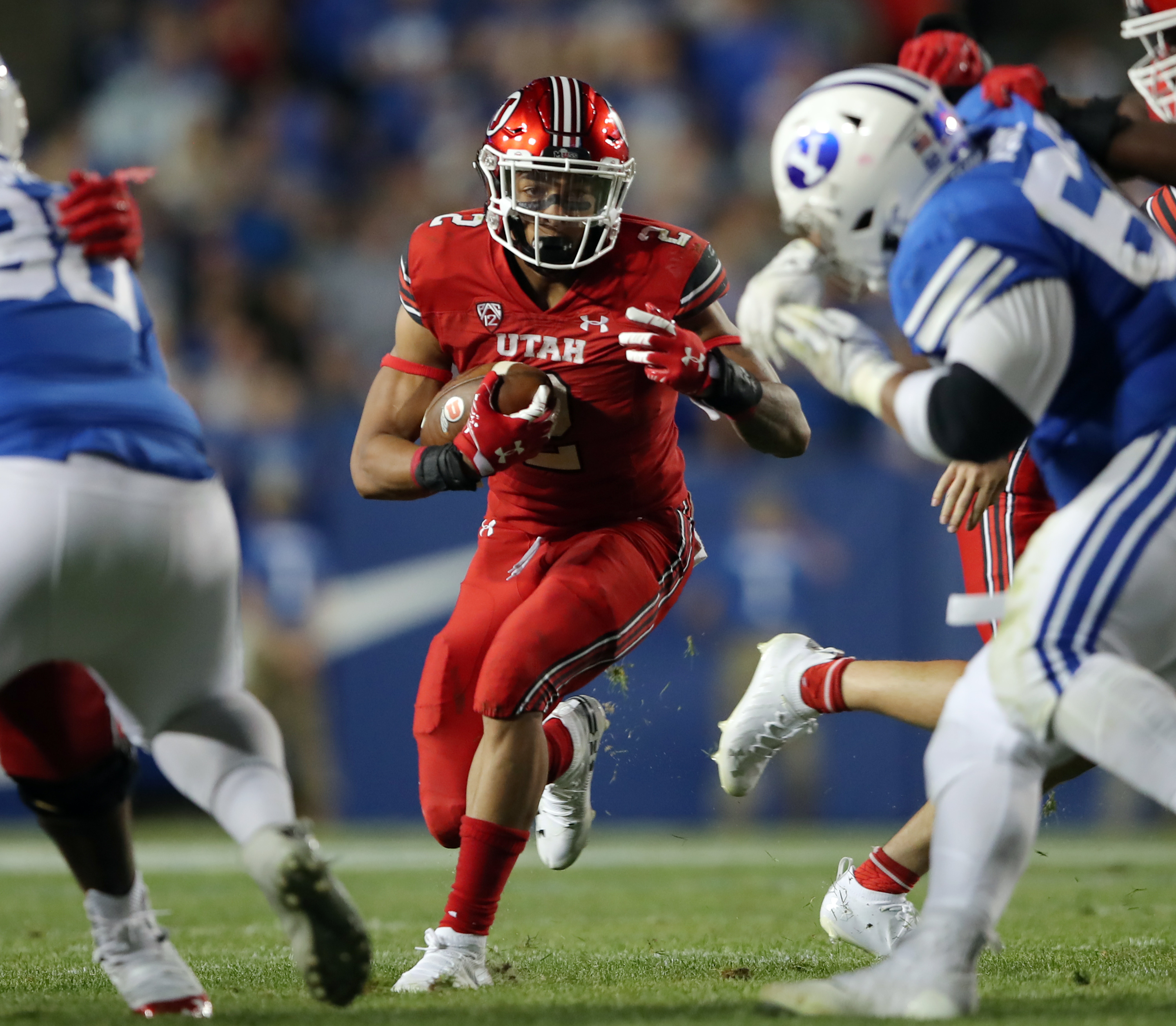 Utah Utes running back Micah Bernard (2) finds an opening in the line as BYU and Utah play an NCAA football game at LaVell Edwards Stadium in Provo on Saturday, Sept. 11, 2021. BYU won 27-16 ending a 9 game losing streak to the Utes.
