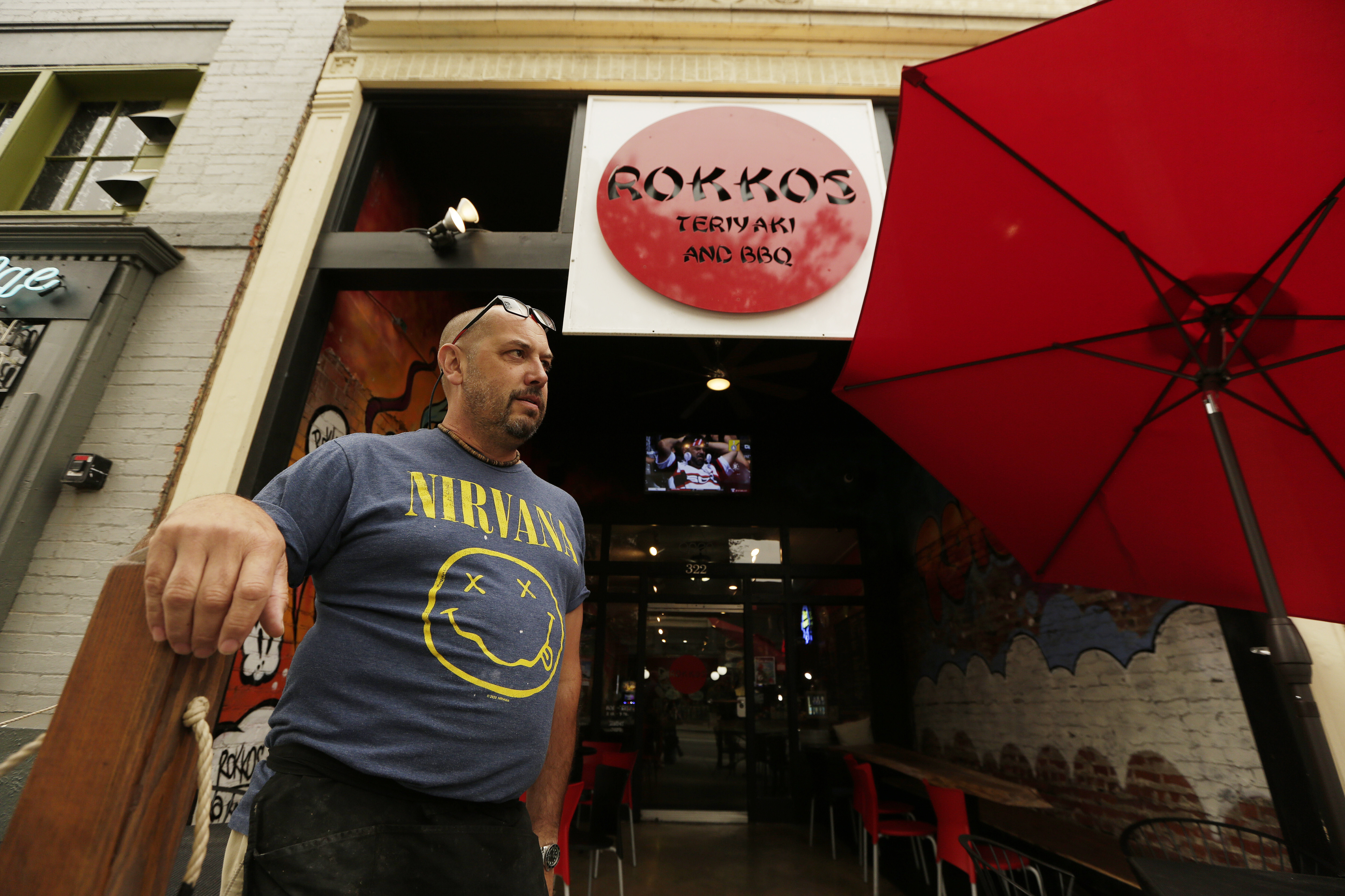 David Hall, co-owner at Rokkos Teriyaki and BBQ, speaks about the effects on business due to coronavirus, Friday, in Coeur d'Alene, Idaho. Northern Idaho has a long and deep streak of antigovernment activism that is confounding attempts to battle a COVID-19 outbreak.