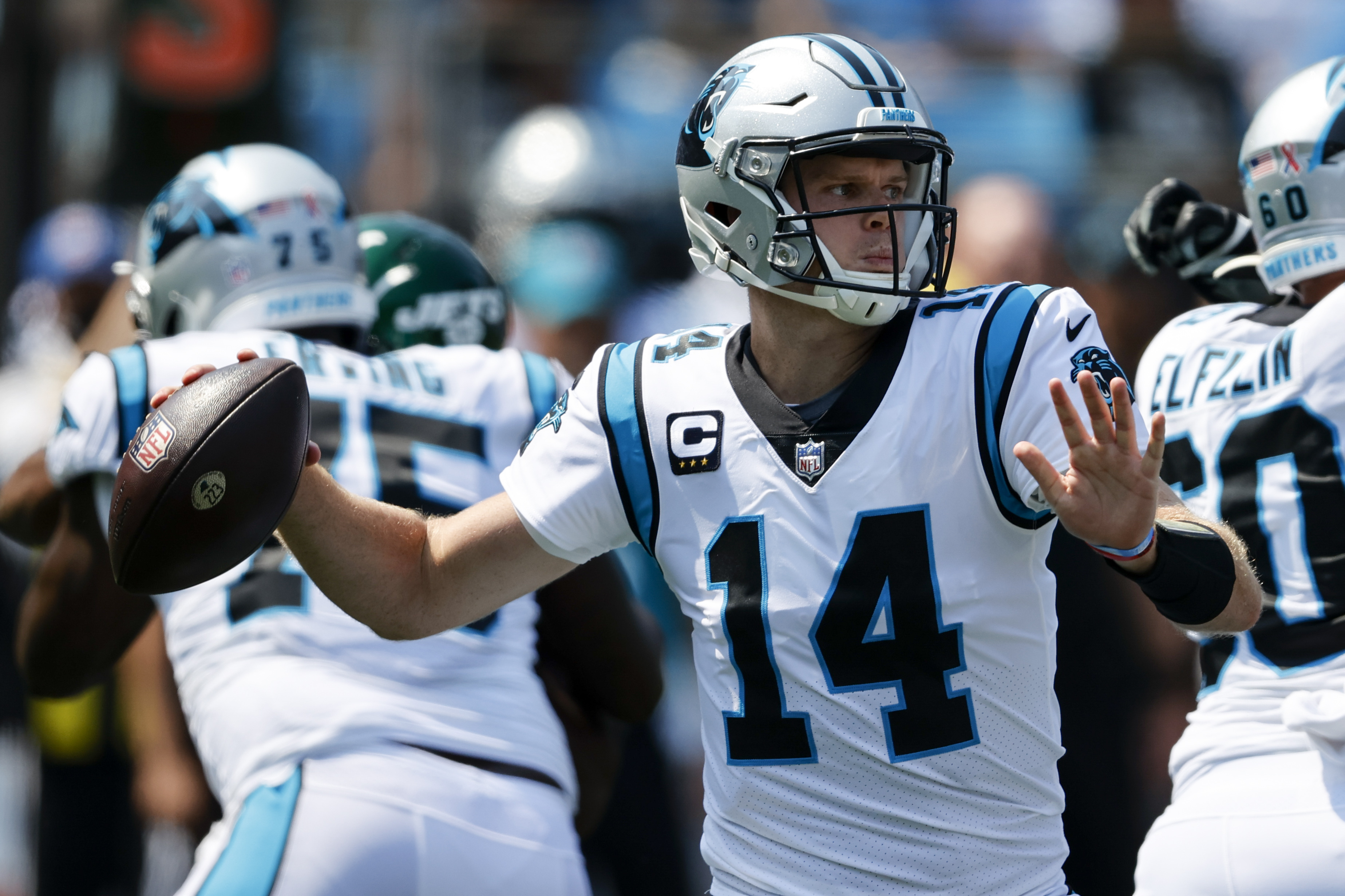 Carolina Panthers quarterback Sam Darnold passes against the New York Jets during the first half of an NFL football game Sunday, Sept. 12, 2021, in Charlotte, N.C.