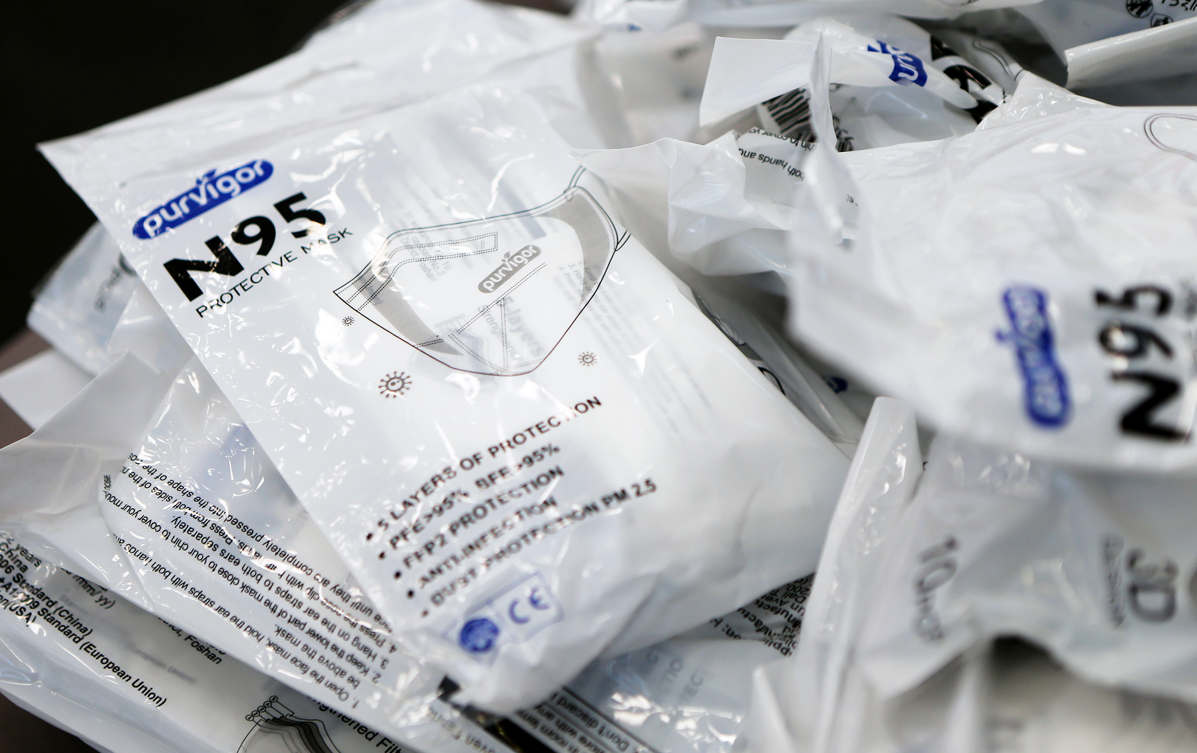N95 masks wait to be packed into boxes at Zagg headquarters in Midvale on April 14, 2020. The CDC recently updated their guidelines on mask choice, usage and disposal.